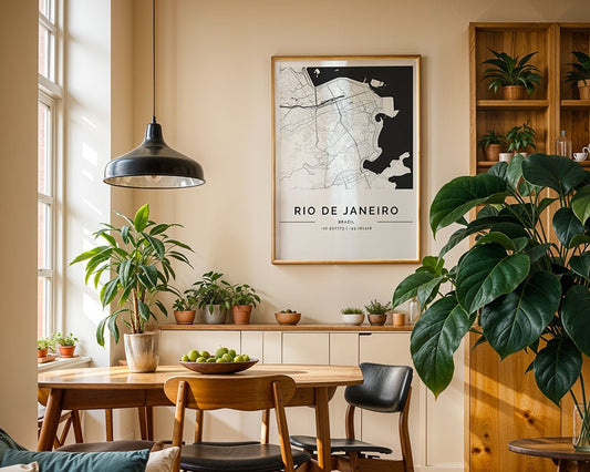 A cozy dining area with a wooden table and chairs is decorated with various potted plants. A framed FN Prints Rio de Janeiro City Map hangs on the wall, while a black pendant light is suspended above the table, which features a bowl of green apples.