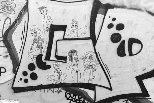 The Anime Graffiti Fusion by FN Prints showcases a black-and-white mural featuring five Japanese anime-inspired characters with distinct hairstyles and outfits, each displaying unique expressions and poses. The dynamic urban art scene is enhanced by abstract shapes and patterns in the background.