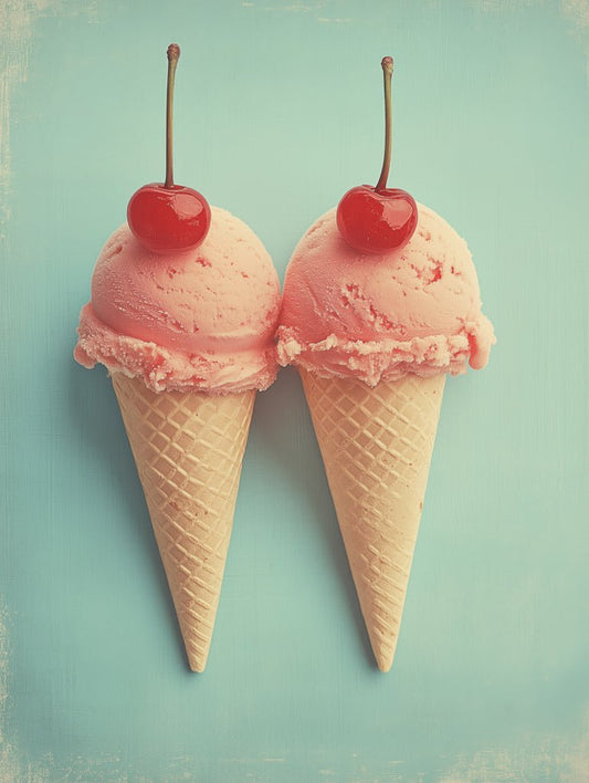 Minimalist retro wall art print of two pink ice cream cones with red cherries, set on a blue pastel background.