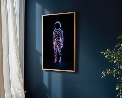 The product "Cosmic Vanguard" by FN Prints adorns the dark blue wall, showcasing a framed futuristic abstract artwork of a person wearing a space helmet outlined in vibrant neon lights. Sunlight filters through sheer curtains, casting delicate shadows and hinting at cosmic intrigue with a plant partially visible in the corner.