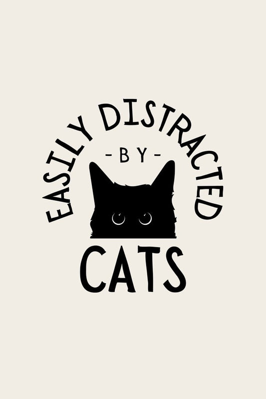 FN Prints offers the "Easily Distracted By Cats" digital artwork poster, featuring a charming silhouette of a cat with wide eyes. The playful font above and below the image reads "Easily Distracted by Cats," making it an ideal piece for cat enthusiasts. A plain background enhances the focus on the delightful feline design.