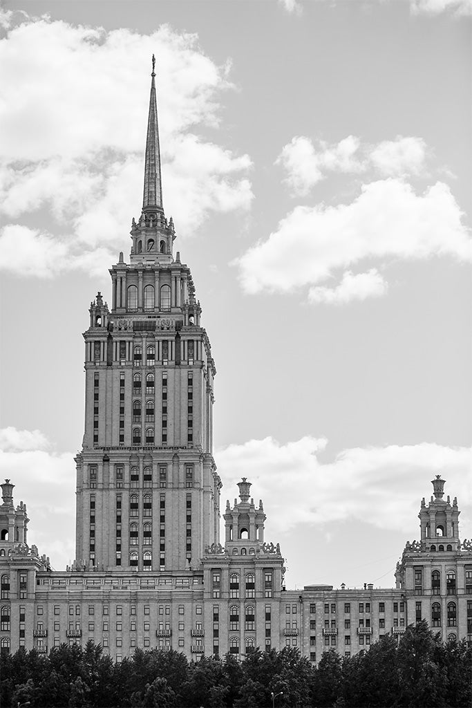 Fine art photography of the Hotel Ukraina in Moscow, a grand Stalinist skyscraper with a massive spire and neoclassical architectural details.