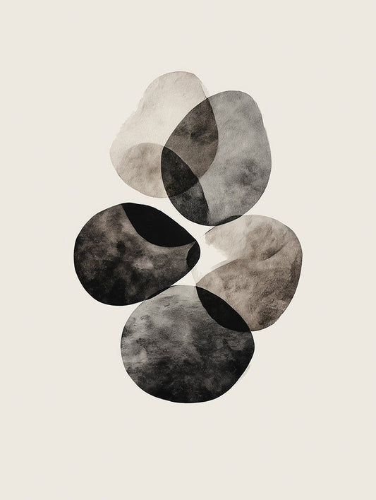 Set of abstract stone shapes in black, gray, and beige on a beige background