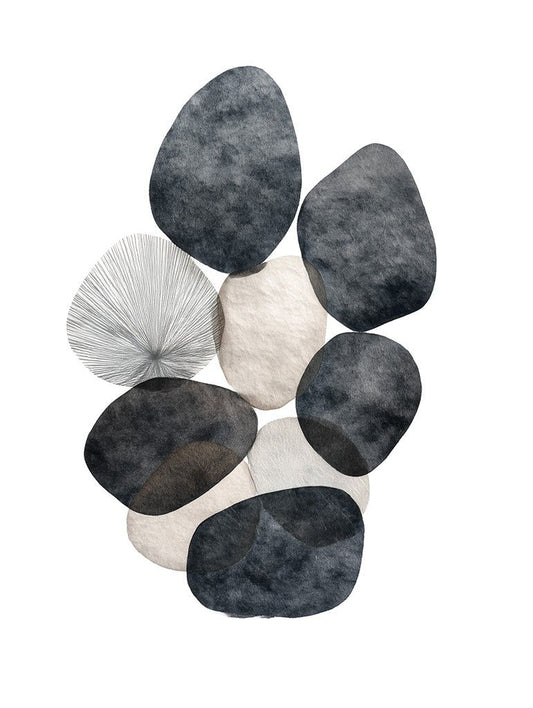 Set of gray and white pebble-shaped coasters on a white background