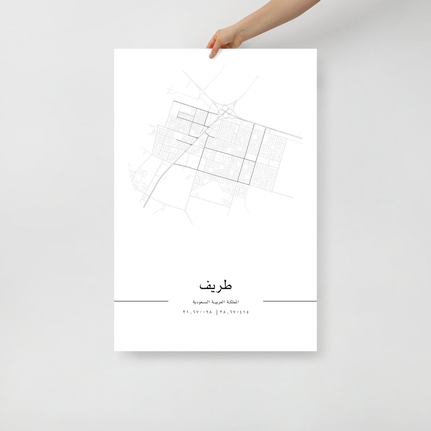 Minimalist black and white street map of Turaif, Saudi Arabia, featuring a detailed grid of city roads and coordinates 31.670098 | 38.670415 at the bottom in arabic.